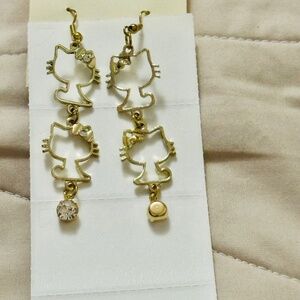 2/$15 Gold tone Hello Kitty earrings 2 on each earring rhinestones-3 on each